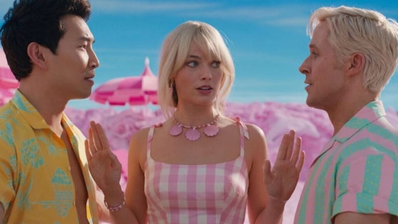 A scene from the Barbie movie, L-R Simu Liu, Margot Robbie and Ryan Gosling