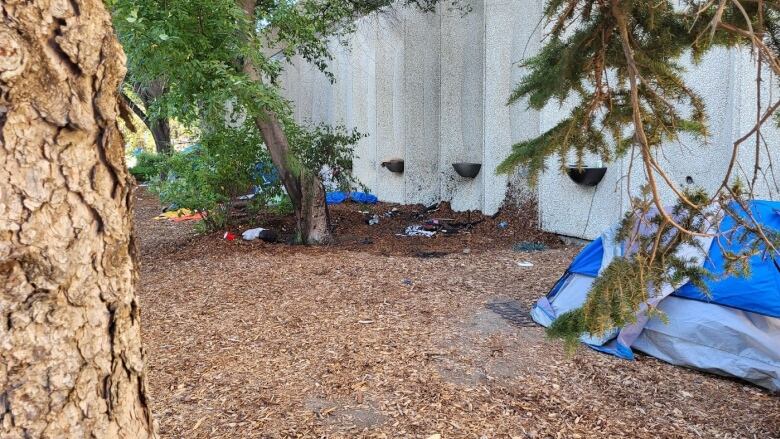 Scene of a burnt tent outside regina city hall