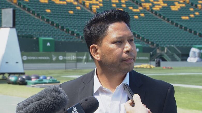 Edmonton Elks president and CEO talking to reporters on July 25, 2023. 