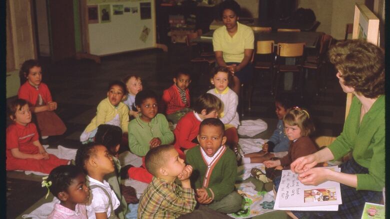 In this 1964 photo of the school at the Cornwallis St. Baptist Church, Catherine Verall and Muriel Cromwell supervise a group of children. 