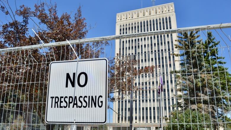 A no trespassing sign was up in front of Regina city hall on Sunday.  