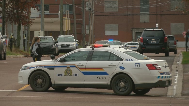 An RCMP car blocks a street.