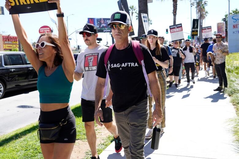 Line of people including actors on the picket line in Los Angeles.