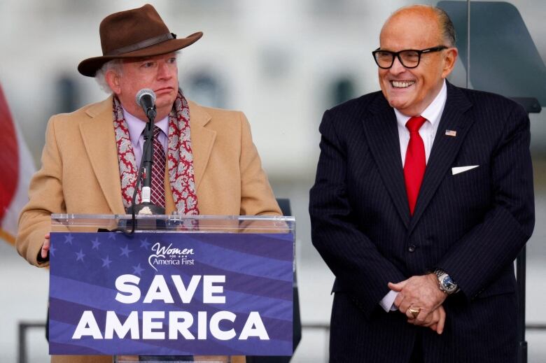 Two men at podium