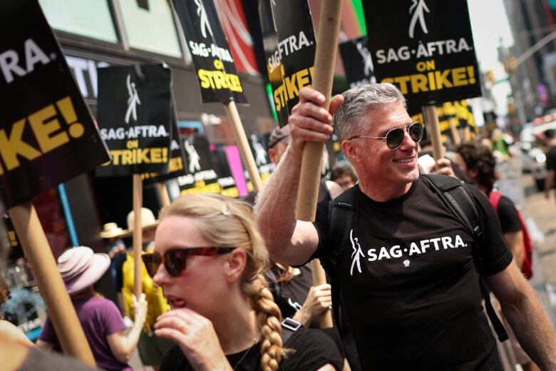 Actors on the picket line in Times Square, New York City.