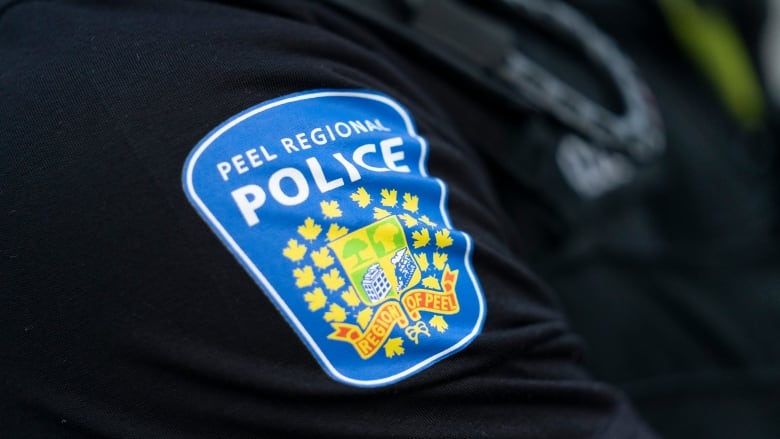 A Peel Regional Police shoulder patch is seen in Mississauga on July 1, 2023.