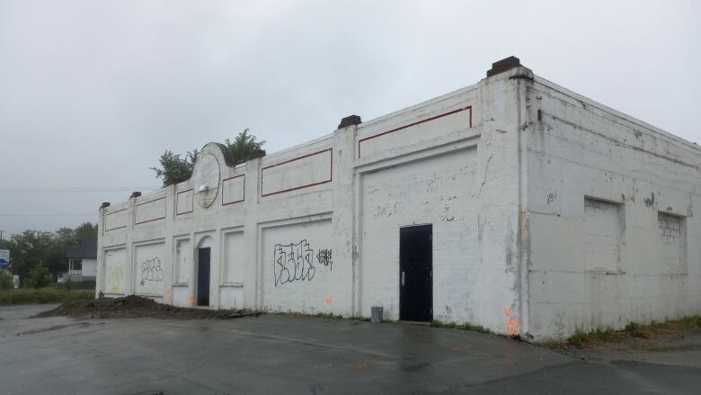 A white concrete building.