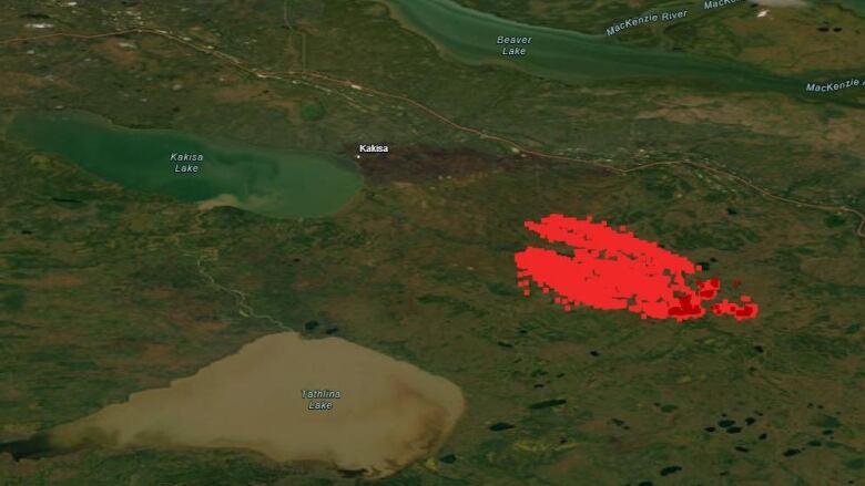 A satellite image shows a red area indicating a wildfire.