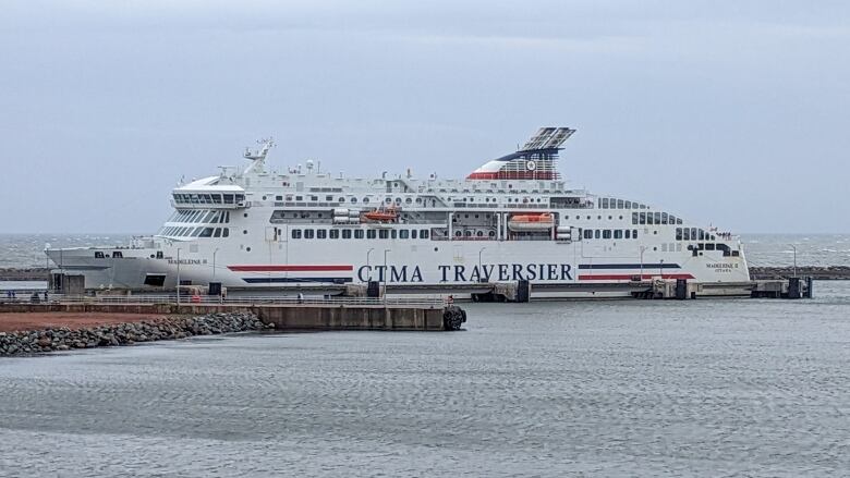 A very large car and passenger ferry is shown at the dock in Souris, P.E.I.