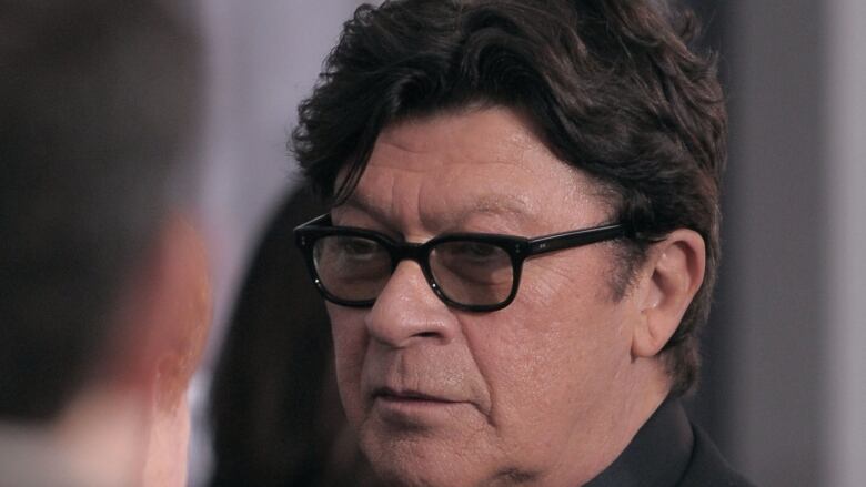 Musician Robbie Robertson is seen at New York's Ziegfeld Theatre in February 2010.