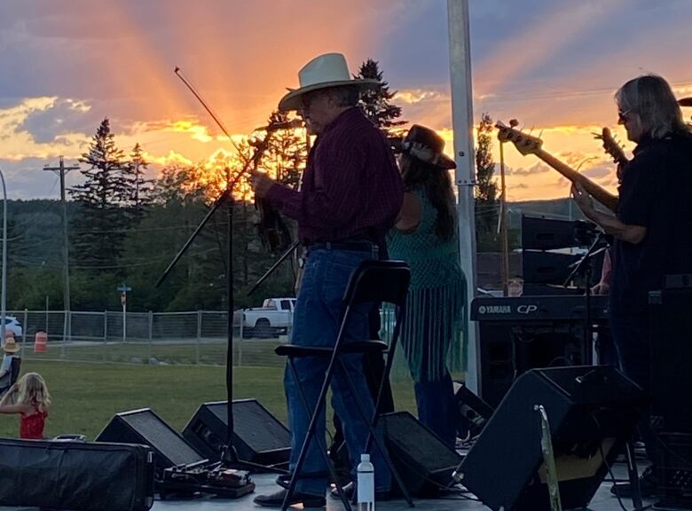 Performers play music at the Ian Tyson Memorial Music Festival.