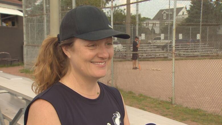 Allyson Cullen stands in front of the softball field in Toronto's Dieppe Park. 