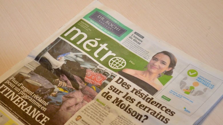 a Metro newspaper on a table