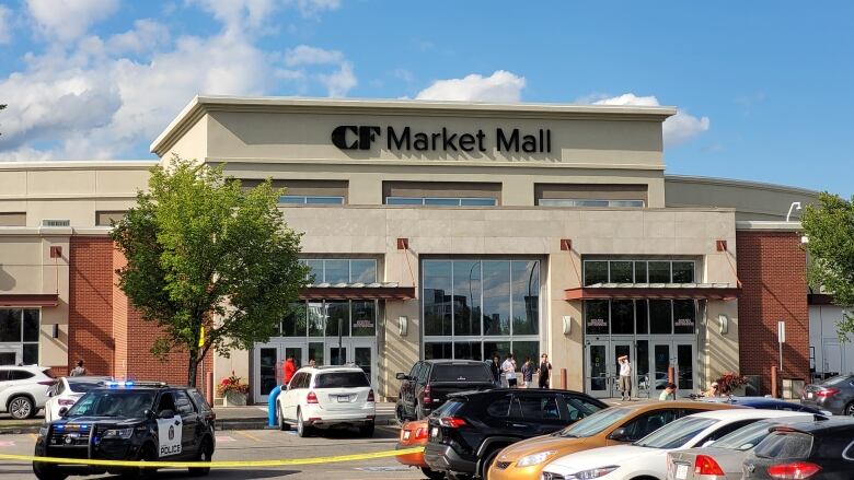 Market mall in Calgary is visible in this shot that also has a police car.