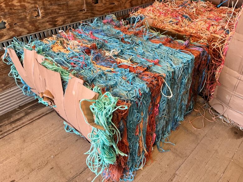 The image shows  colorful baler twine ready to be dropped off for recycling.