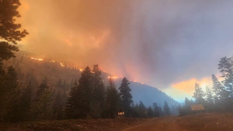 A wildfire over the hills.