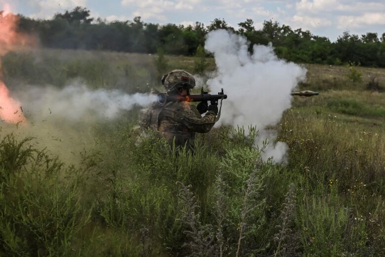 A Ukrainian soldier is seen taking part in a military exercise in Ukraine's Dnipropetrovsk region on Wednesday.