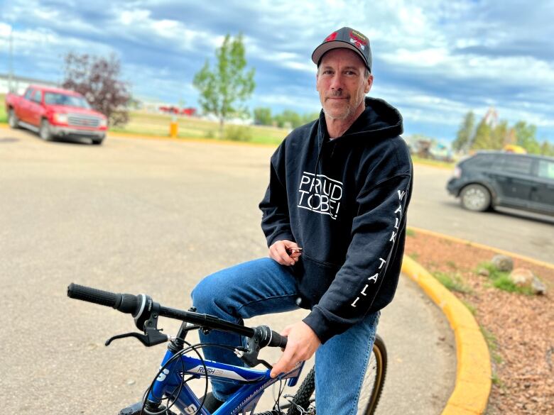 A man on his bike.