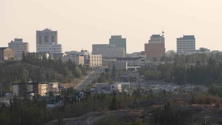 Buildings in Yellowknife with a smoky sky.