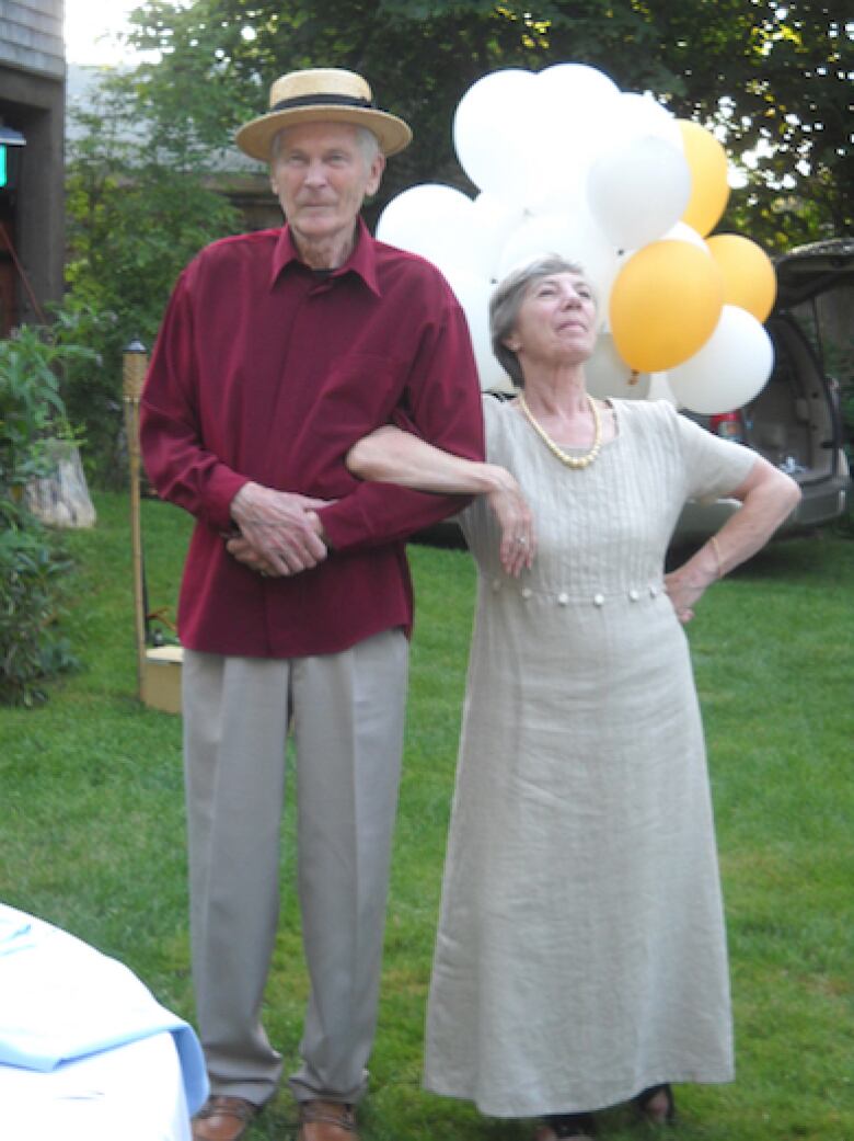 James and Pauline How pose for a photo. 