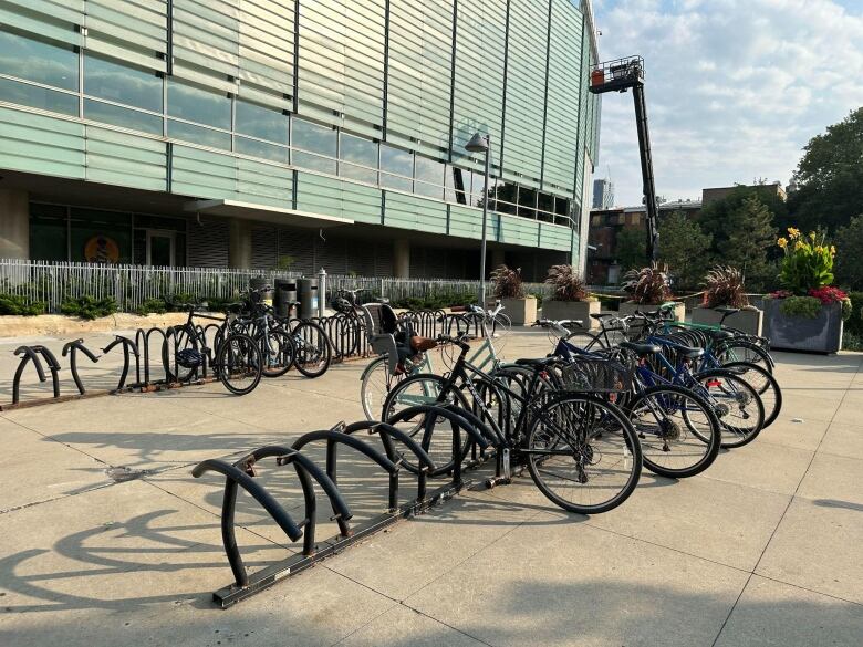 Bicycles are locked up at a bike rack behind the national library and archives, BAnQ, in Montreal. 