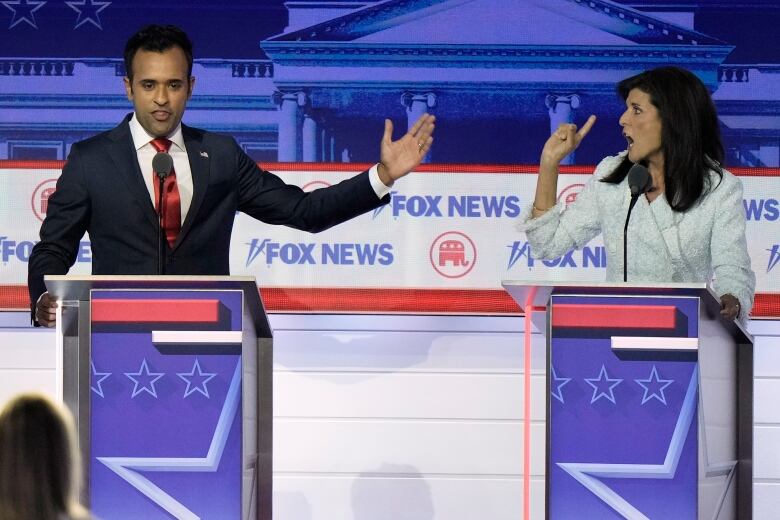 Businessman Vivek Ramaswamy and former U.N. Ambassador Nikki Haley in a testy exchange during the first Republican presidential primary debate in Milwaukee. (AP Photo/Morry Gash)