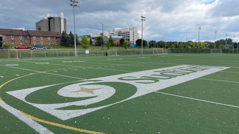 a green field with Sudbury written on it