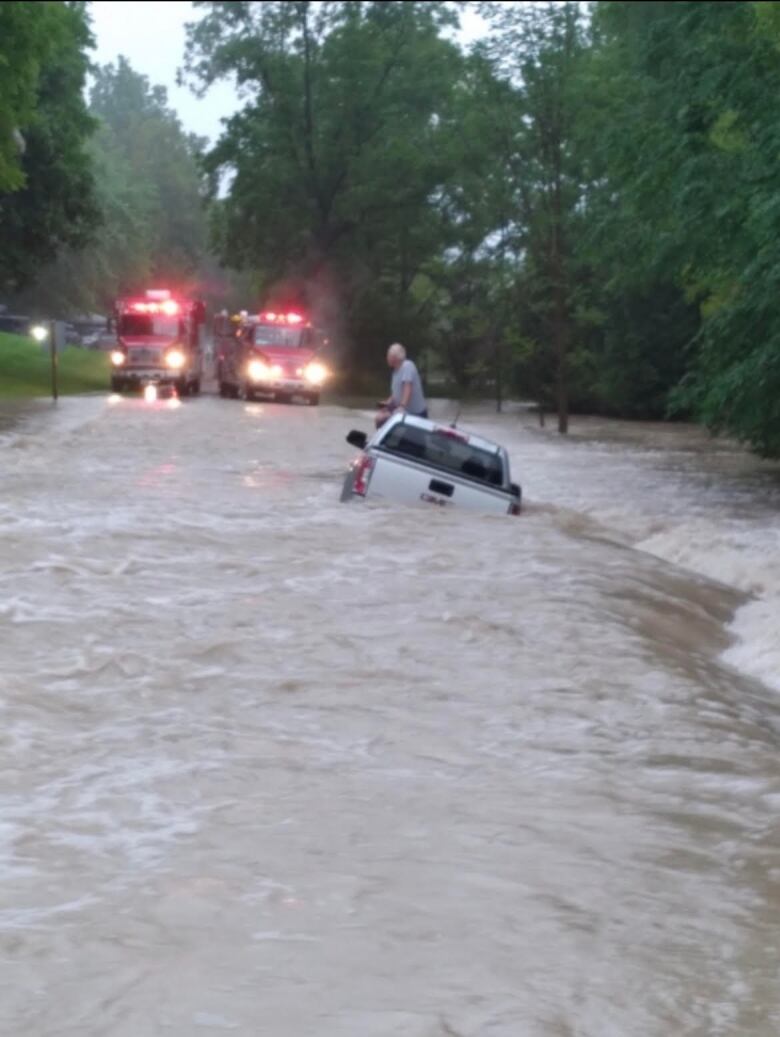 The roadway in AW Campbell Conservation Area was impossible to travel over Wednesday night. By Friday, the only way out of the park was on foot as campers waited for workers to lay down gravel. 