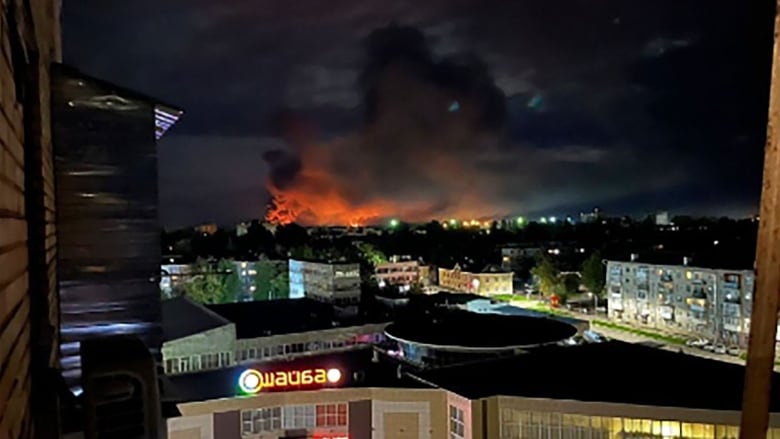 Flames and smoke rise from a fire in Pskov, Russia.