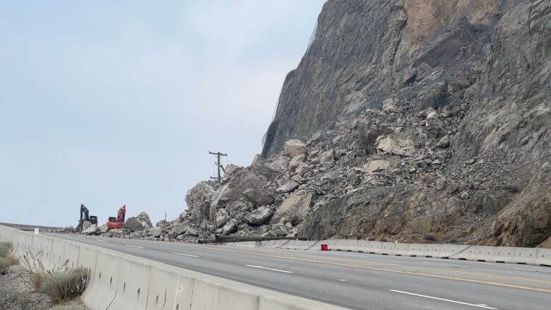 Rocks fallen on the road.