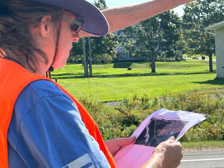 A search volunteer looks at a map of the Montague area.