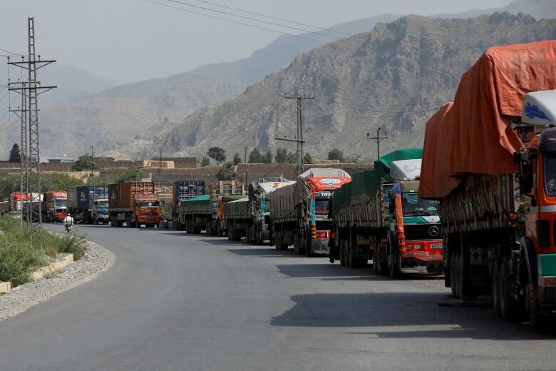 Trucks loaded with supplies to leave for Afghanistan are seen stranded at the Michni checkpost, after the main Pakistan-Afghan border crossing closed after clashes, in Torkham, Pakistan September 7, 2023.