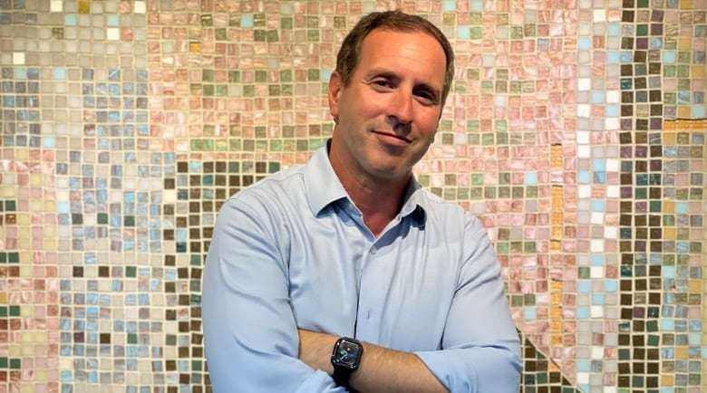 A photograph of Josh Matlow inside Toronto City Hall. He's the City Councillor representing Ward 12 TorontoSt. Paul's who has been pushing for a maximum temperature bylaw in Toronto for years.