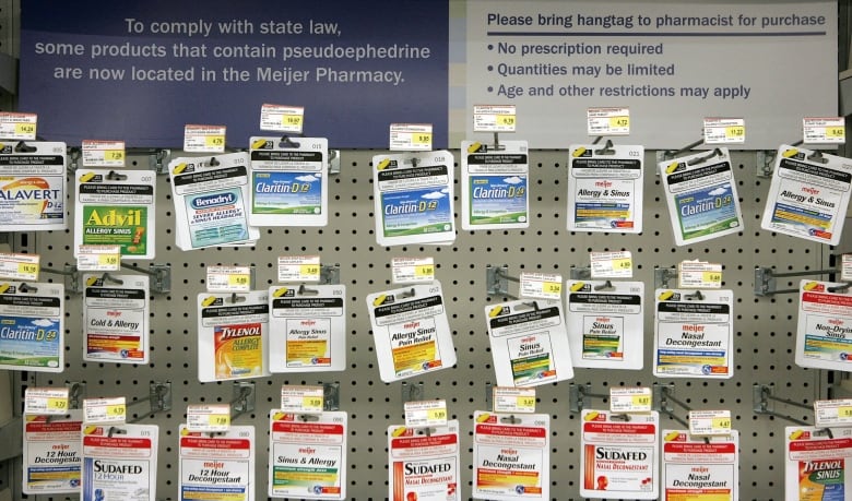 Product identification cards are shown for medicines containing pseudoephedrine at a Meijer store in Roseville, Mich., Tuesday, Dec. 13, 2005.  Beginning on Thursday, several cold and allergy pills were harder to get in Michigan, a move designed to combat the state's worsening methamphetamine problem. Under a new state law, only consumers above age 17 can buy Sudafed, Claritin-D and other products with ephedrine or pseudoephedrine. Adult customers are limited to two packages (48 tablets) per visit. 