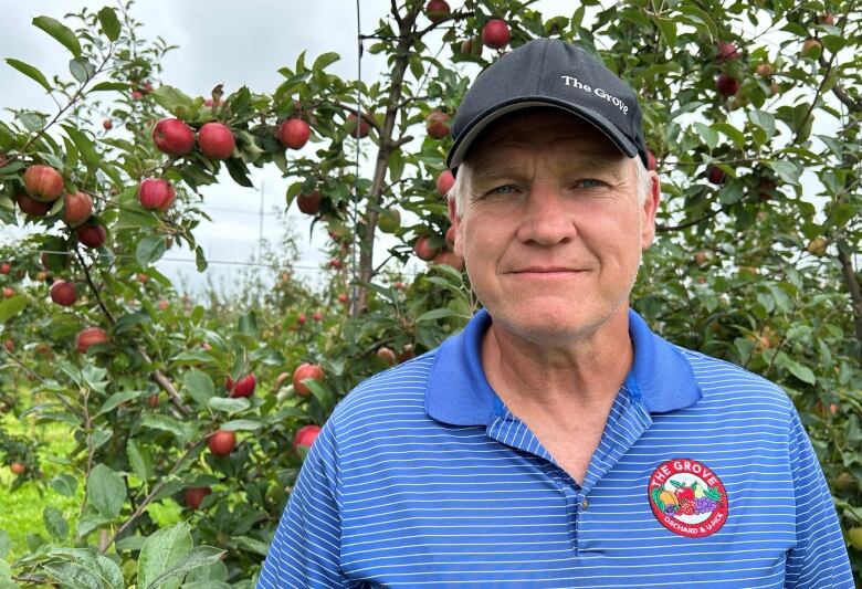 Geoff Boyle in his orchard.