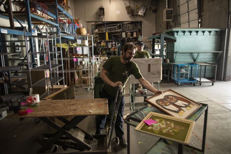 Workers are pictured at the Acme Prop Shop in Burnaby, B.C, on Thursday, September 7, 2023.