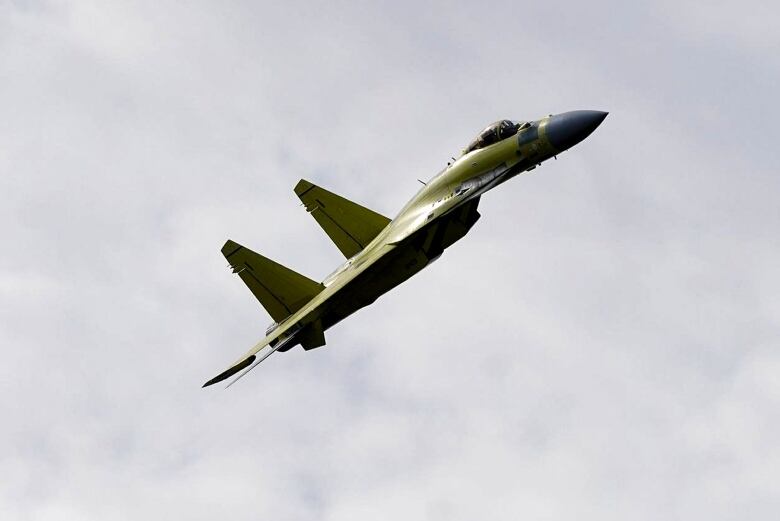 A fighter jets is seen flying in the sky.