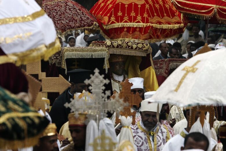 Addis Ababa, Ethiopia:  Ethiopian Orthodox priests parade the Tabot through the streets of Addis Ababa during the Timqat on 19 January 2006.