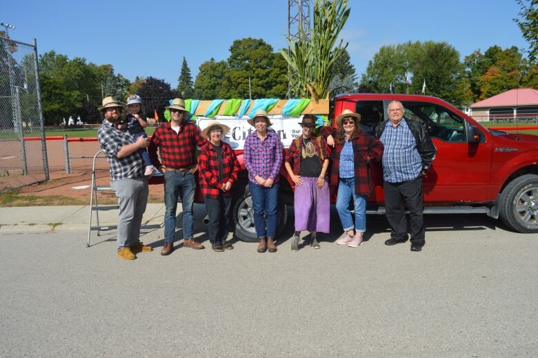 From left, Shawn Loughlin (editor), Tallulah Loughlin (editor-in-training), Scott Stephenson (reporter), Joan Caldwell (Production Designer), Shelley Kroes (advertising sales), Chelsea Gamble (freelance writer), Deb Sholdice (publisher), John Stephenson (photographer). They account for most of the eight person team of North Huron Publishing, and are pictured at the Brussels Fall Fair Parade on September 20, 2023.