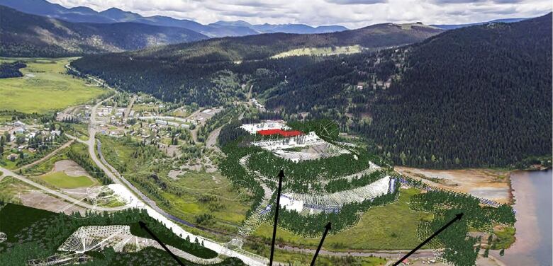 Plans for above-ground structures are overlaid on a photograph of the area around a small town, in a rural forested area with mountains in the background.