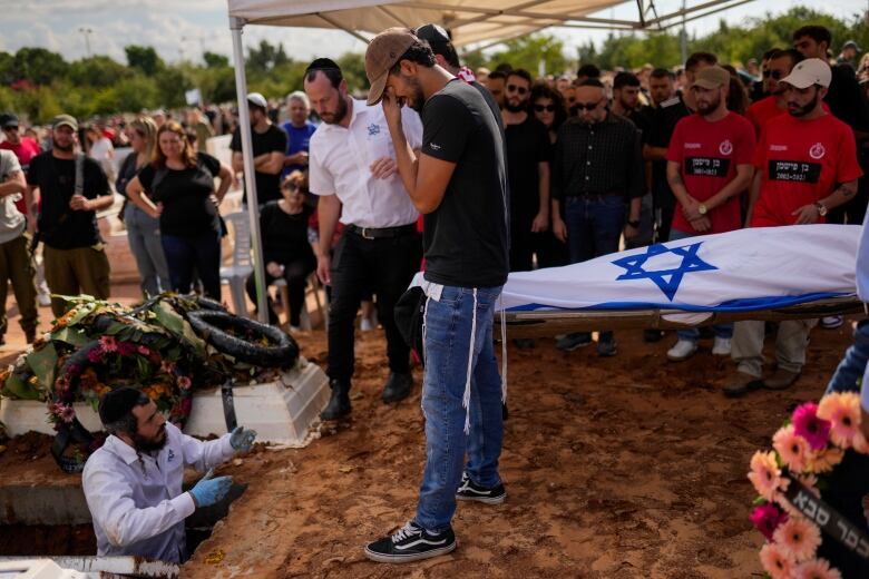 A man is buried in Israel.