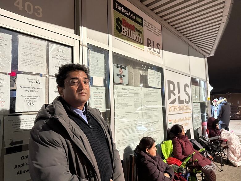 Pratik Verman, OCI applicant waiting outside the BLS international office. 