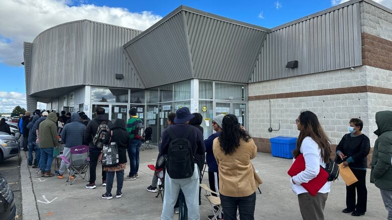 Line up outside Brampton BLS international for OCI applications.