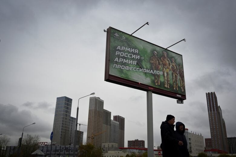 A billboard promoting the Russian army is seen on display in Moscow.