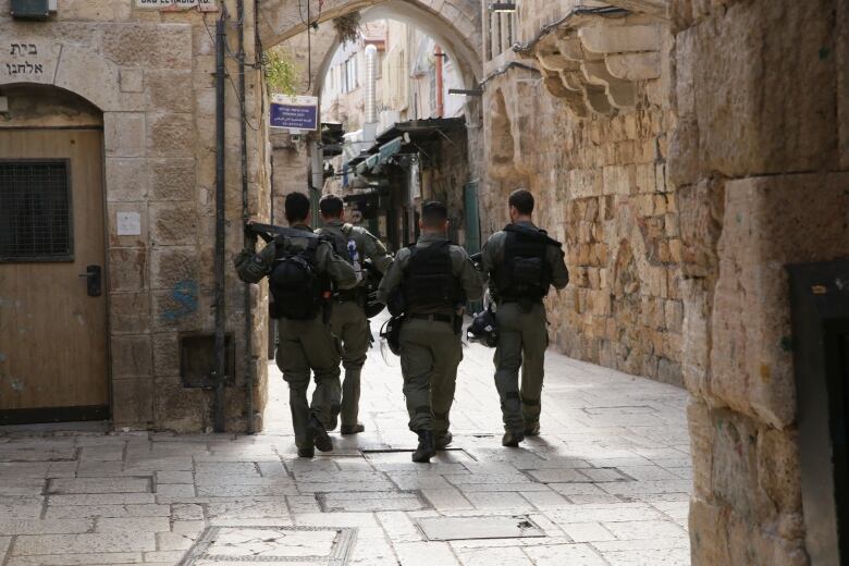  Israeli border police patrolling in the Muslim Quarter of the Old City, Jerusalem, ahead of Friday prayers 