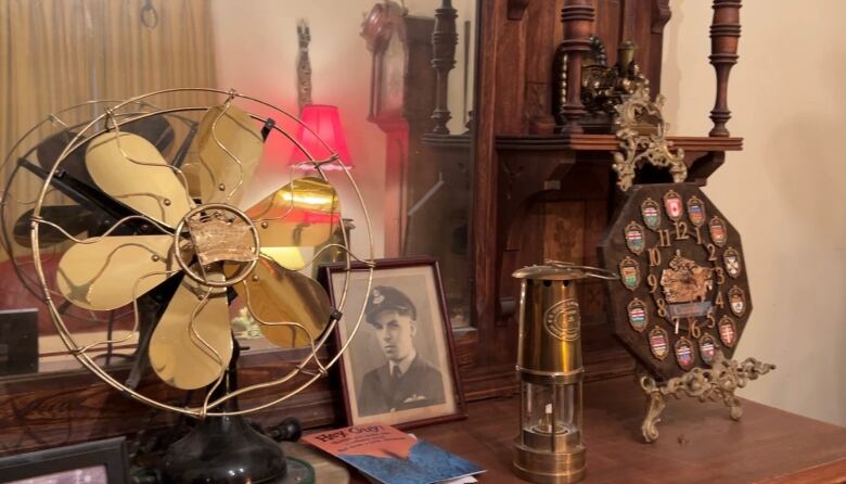 Antiques on a dresser.