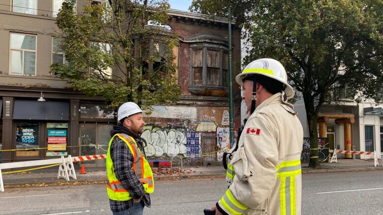 Vancouver Fire Rescue Services attend the site of a potential building collapse on Main Street.