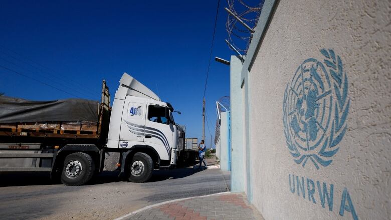 An aid truck arrives at a UN storage facility in the Gaza Strip on Saturday, Oct. 21, 2023.