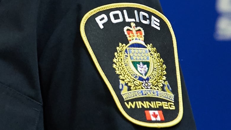 A Winnipeg police badge is shown.