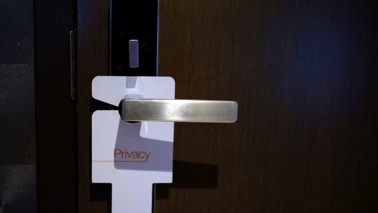 A 'Privacy' sign hangs on the door of a hotel room in New York, U.S, May 31, 2018. REUTERS/Hannah McKay